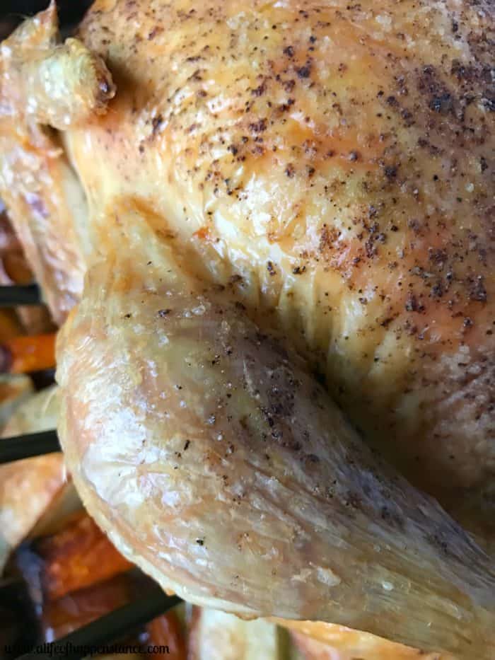 A close up of a roasted chicken leg. 