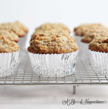 Healthy banana cinnamon muffins cooling on a wire rack.