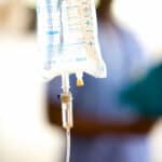 A hanging IV bag.