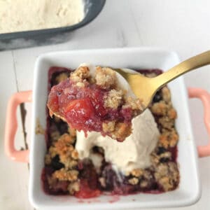 A spoonful of cherry peach crumble.