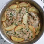 Cooked chicken in a large skillet.